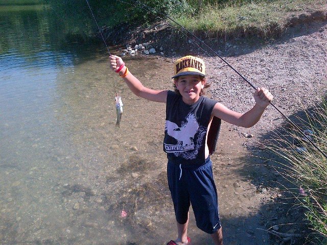 saab 262.jpg - Carter getting hooked on fishing....The start to a great fishing career